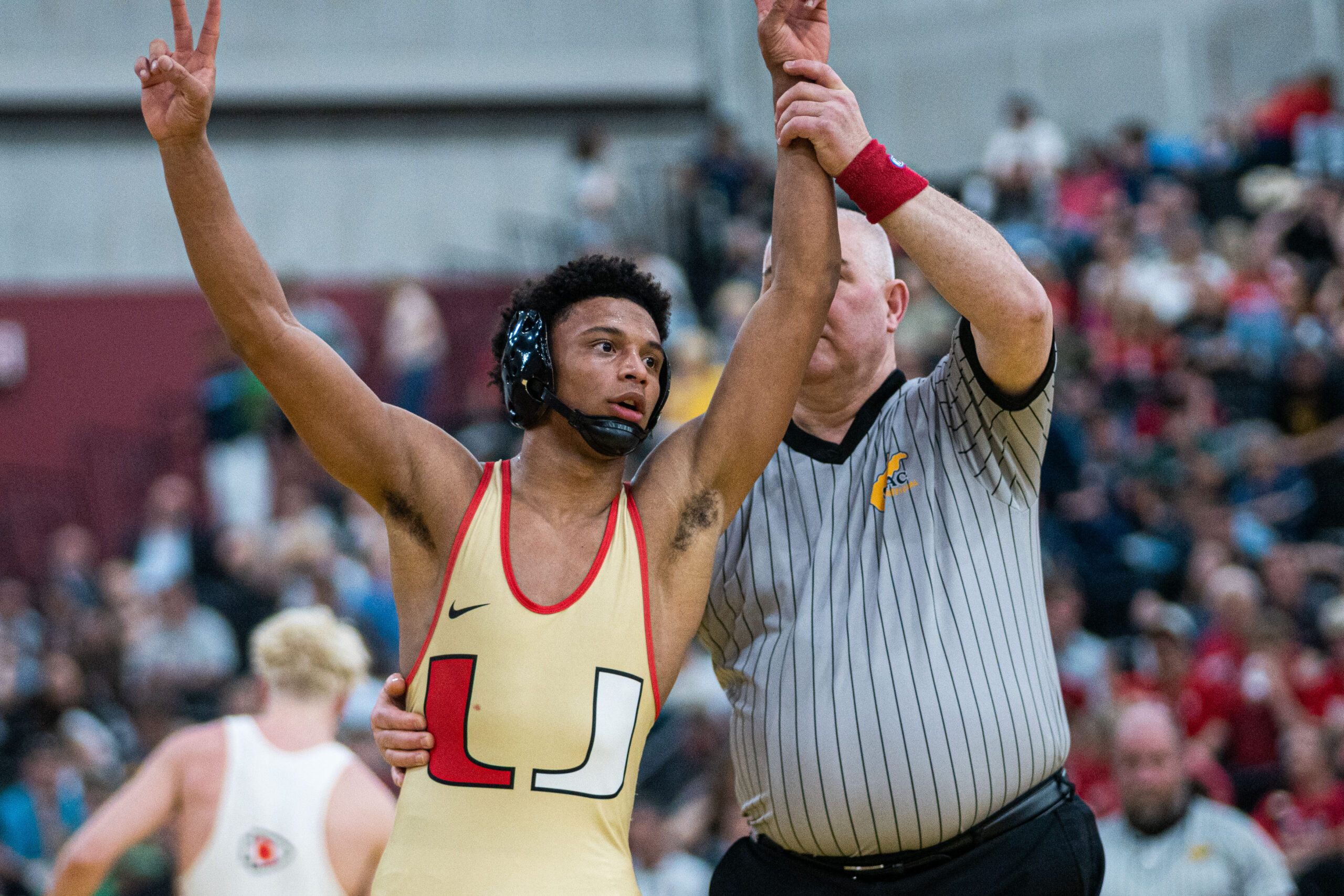 University High wrestling claims third straight state championship, crowns three individual title winners